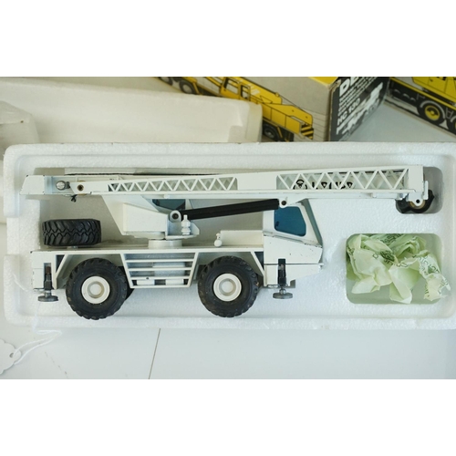 1236 - Four boxed  NZG1/50 diecast construction models to include Demag HC170 Sparrows, Demag HC130, Demag ... 