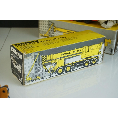 1236 - Four boxed  NZG1/50 diecast construction models to include Demag HC170 Sparrows, Demag HC130, Demag ... 