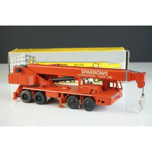 1236 - Four boxed  NZG1/50 diecast construction models to include Demag HC170 Sparrows, Demag HC130, Demag ... 