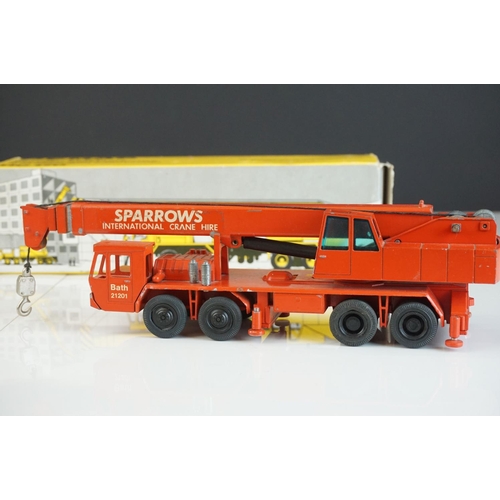 1236 - Four boxed  NZG1/50 diecast construction models to include Demag HC170 Sparrows, Demag HC130, Demag ... 