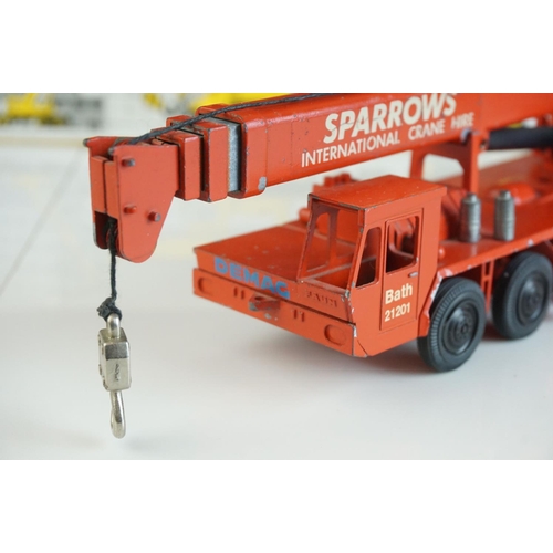 1236 - Four boxed  NZG1/50 diecast construction models to include Demag HC170 Sparrows, Demag HC130, Demag ... 