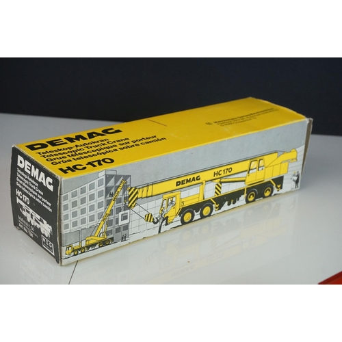 1236 - Four boxed  NZG1/50 diecast construction models to include Demag HC170 Sparrows, Demag HC130, Demag ... 