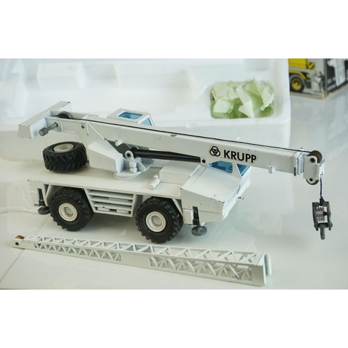 1236 - Four boxed  NZG1/50 diecast construction models to include Demag HC170 Sparrows, Demag HC130, Demag ... 