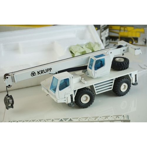 1236 - Four boxed  NZG1/50 diecast construction models to include Demag HC170 Sparrows, Demag HC130, Demag ... 