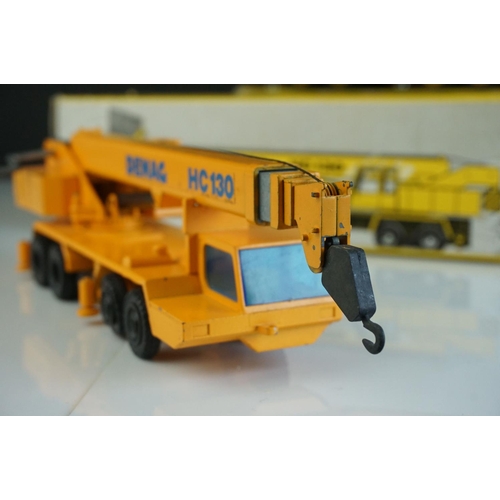 1236 - Four boxed  NZG1/50 diecast construction models to include Demag HC170 Sparrows, Demag HC130, Demag ... 