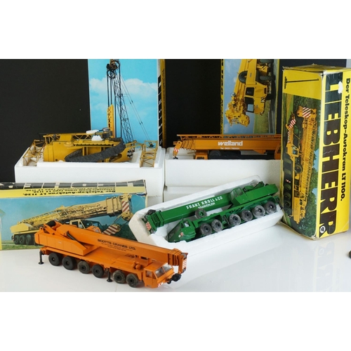 Four boxed Conrad 1/50 Liebherr diecast construction models to