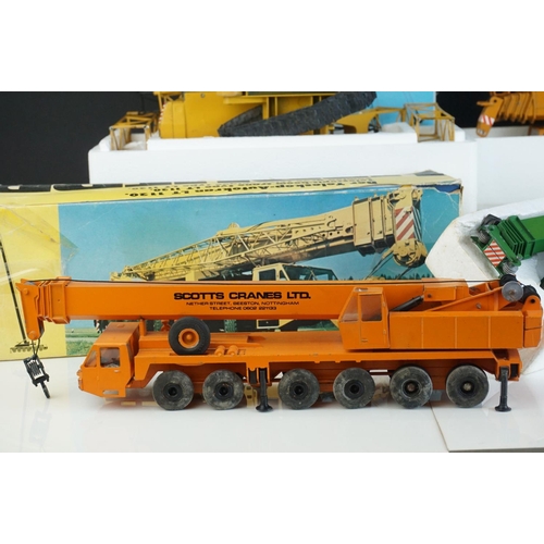 1238 - Four boxed Conrad 1/50 Liebherr diecast construction models to include 2831 Liebherr HS881, 2082 LTM... 