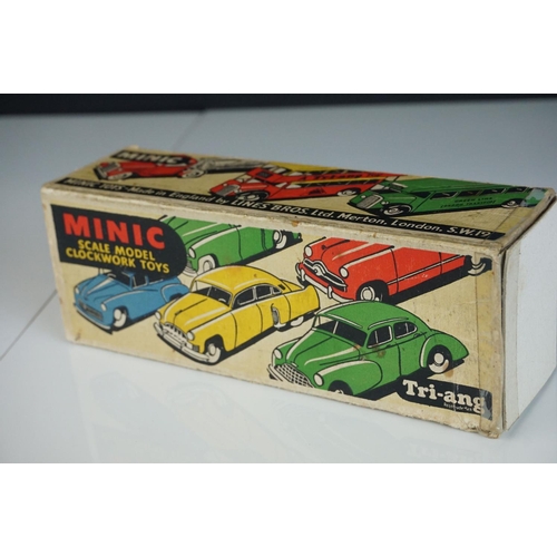 1254 - Four Triang Minic clockwork tin plate commercial models in good overall condition with wear, contain... 