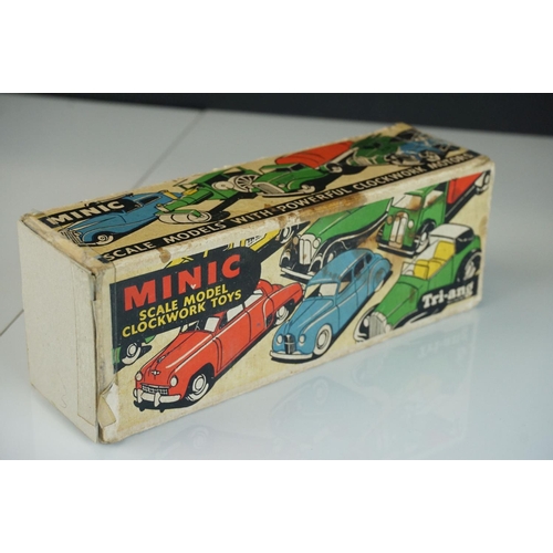 1254 - Four Triang Minic clockwork tin plate commercial models in good overall condition with wear, contain... 