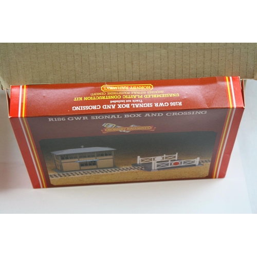 166 - Quantity of boxed / carded / bagged and unused OO / HO gauge model railway accessories to incluee Ho... 