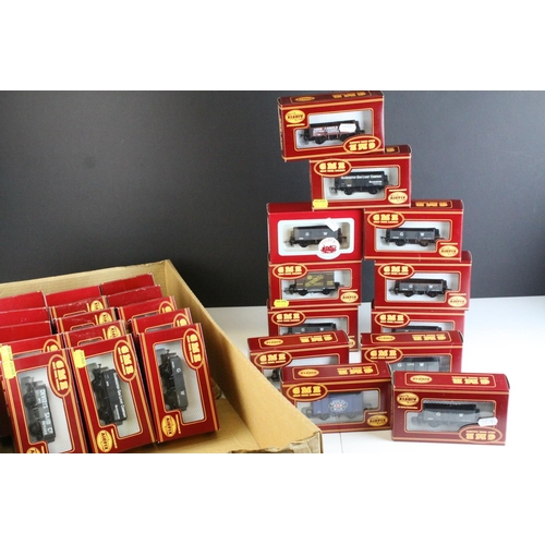 18 - 30 Boxed Airfix GMR OO gauge items of rolling stock featuring wagons and trucks