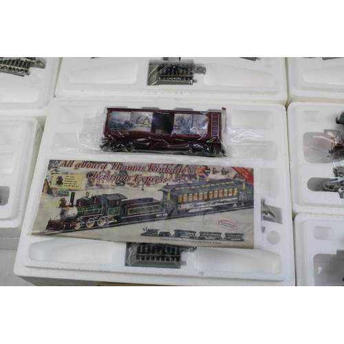 188 - Boxed HO Gauge Thomas Kinkade Christmas Express  electric train set to include engine, tender, 7 x c... 