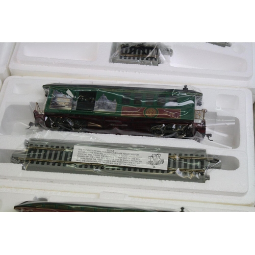 188 - Boxed HO Gauge Thomas Kinkade Christmas Express  electric train set to include engine, tender, 7 x c... 