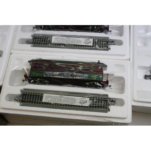 188 - Boxed HO Gauge Thomas Kinkade Christmas Express  electric train set to include engine, tender, 7 x c... 