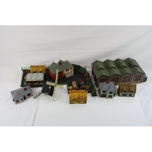 214 - Large quantity of OO gauge model railway accessories to incldue trackside buildings and track