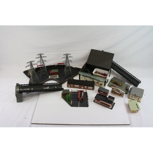 214 - Large quantity of OO gauge model railway accessories to incldue trackside buildings and track