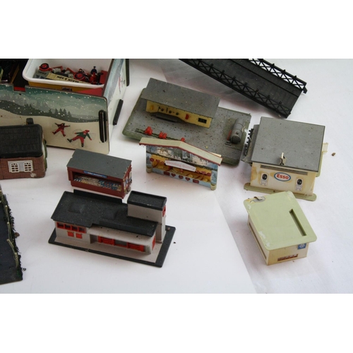 214 - Large quantity of OO gauge model railway accessories to incldue trackside buildings and track