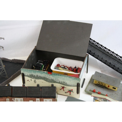 214 - Large quantity of OO gauge model railway accessories to incldue trackside buildings and track