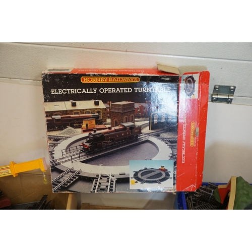 235 - Large quantity of OO gauge model railway to include track, spares, repairs and trackside buildings (... 