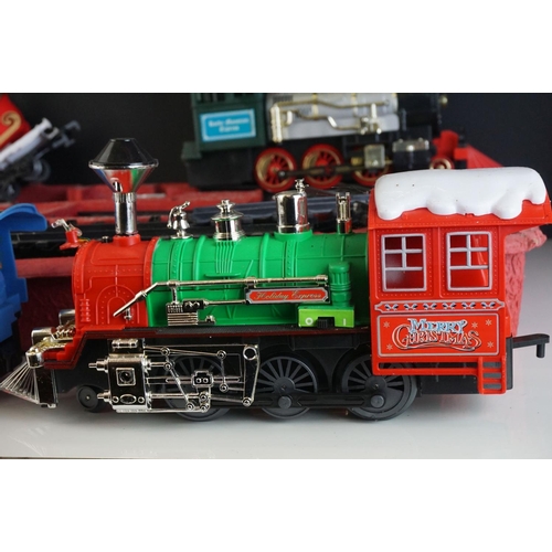 236 - Plastic O gauge model railway to include Old Tomer locomotive and rolling stock set plus 3 x other l... 