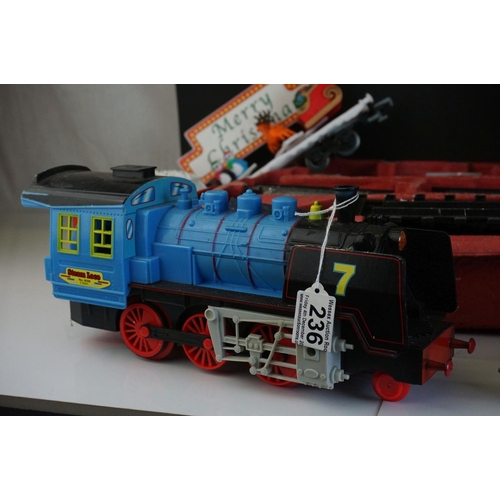 236 - Plastic O gauge model railway to include Old Tomer locomotive and rolling stock set plus 3 x other l... 