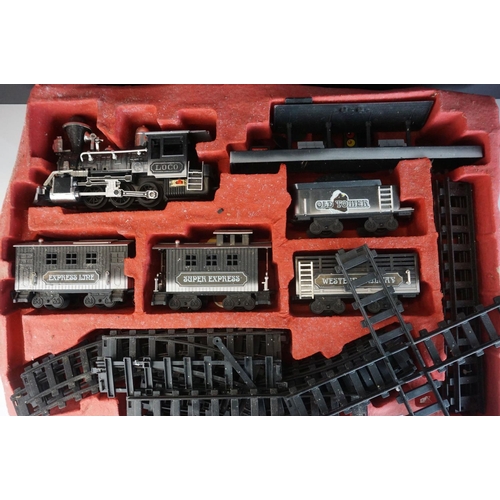 236 - Plastic O gauge model railway to include Old Tomer locomotive and rolling stock set plus 3 x other l... 