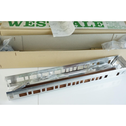 248 - Four boxed Westdale O gauge metal kit models to include a built BR Railcar locomotive in green liver... 