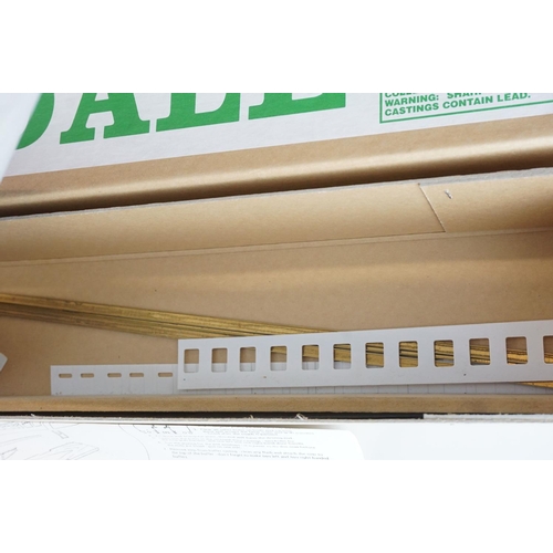 248 - Four boxed Westdale O gauge metal kit models to include a built BR Railcar locomotive in green liver... 