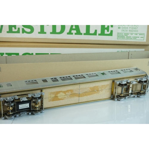 248 - Four boxed Westdale O gauge metal kit models to include a built BR Railcar locomotive in green liver... 