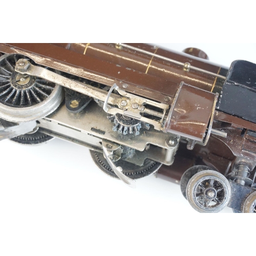 260a - Hornby O gauge 4-4-0 clockwork Nord 31801 locomotive in brown livery, missing one wheel, plus boxed ... 