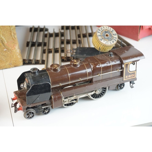 260a - Hornby O gauge 4-4-0 clockwork Nord 31801 locomotive in brown livery, missing one wheel, plus boxed ... 