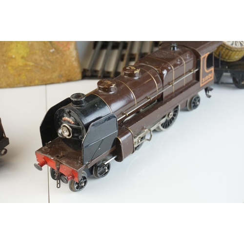 260a - Hornby O gauge 4-4-0 clockwork Nord 31801 locomotive in brown livery, missing one wheel, plus boxed ... 