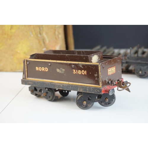 260a - Hornby O gauge 4-4-0 clockwork Nord 31801 locomotive in brown livery, missing one wheel, plus boxed ... 