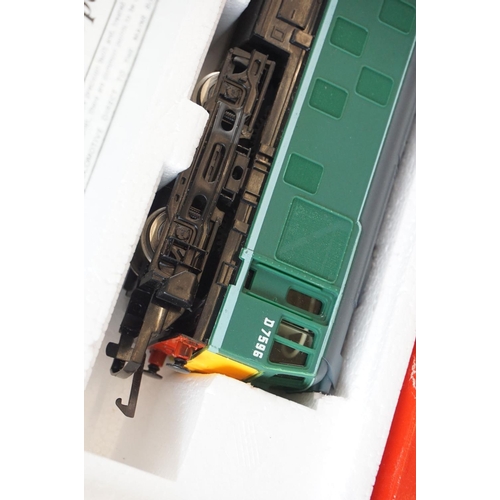 261 - Four boxed OO gauge locomotives to include 2 x Hornby (R072 BR Class 25 Diesel green & R355 MR 4-4-0... 