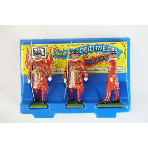 275 - Boxed Jo Hill Co ref 191 Guards (incomplete) plus 4 x Britains New Metal Models three figure sets (o... 