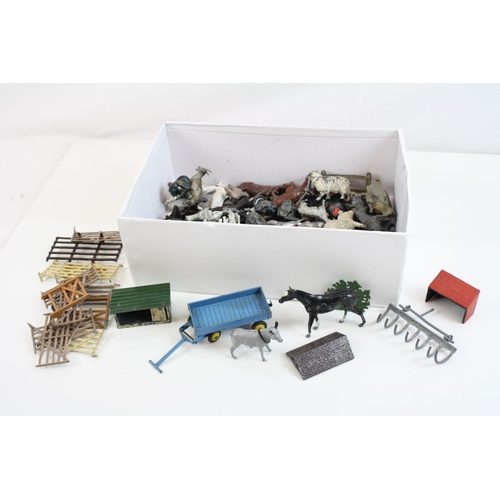 278 - Quantity of mid 20th C metal farm animals & accessories to include Britains