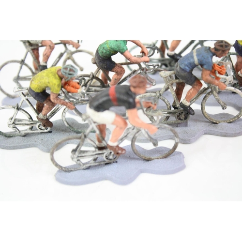 280 - 18 Britains Miniature Cyclists figures plus additional accessories, grubby but gd overall