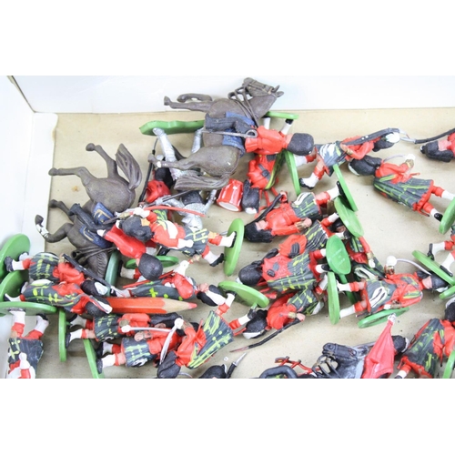 281 - Quantity of Britains plastic soldiers, various guards with some horseback in vg condition