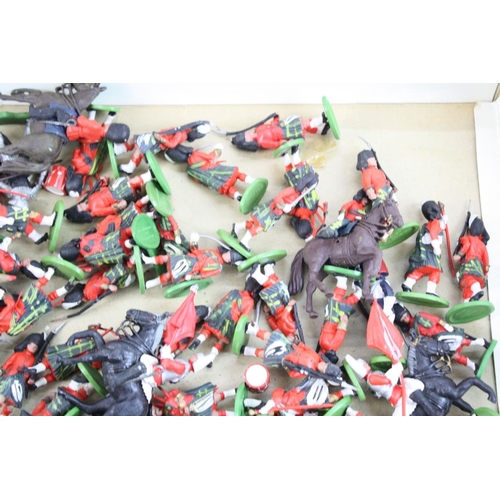 281 - Quantity of Britains plastic soldiers, various guards with some horseback in vg condition