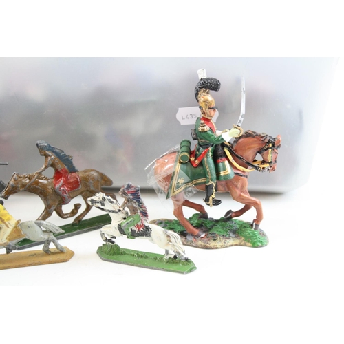 301 - Quantity of vintage metal figures mainly Wild West on horseback, some paint loss and play wear