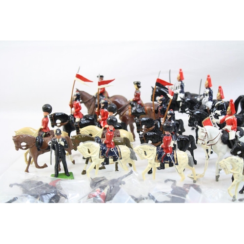 303 - Good collection of metal soldiers and figures, many Britains examples, some play wear, some repainte... 