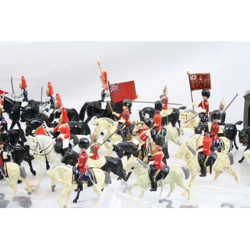 303 - Good collection of metal soldiers and figures, many Britains examples, some play wear, some repainte... 