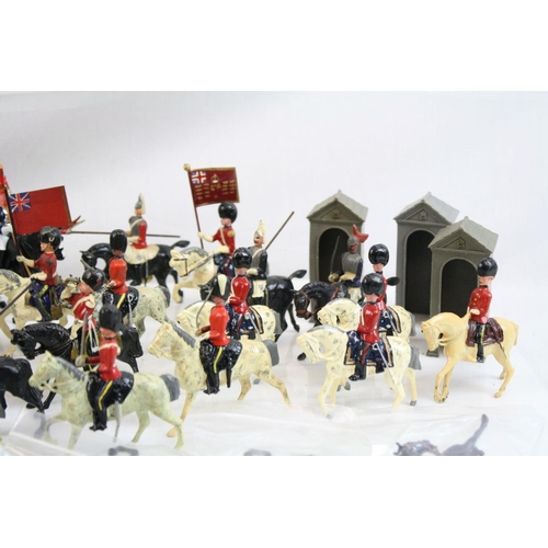 303 - Good collection of metal soldiers and figures, many Britains examples, some play wear, some repainte... 