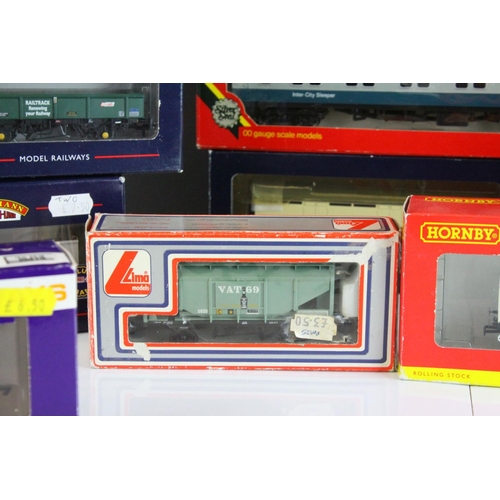 33 - 13 Boxed OO gauge items of rolling stock to include 6 x Hornby, 4 x Bachmann, 2 x Dapol and 1 x Lima... 