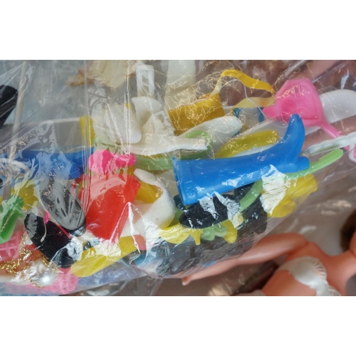 358 - Quantity of 1960/70s plastic fashion dolls in the Sindy style, plus various accessories