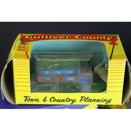 40 - Six boxed Lone Star  OOO Gauge Gulliver County Town & Country Planning rubber buildings to include 1... 