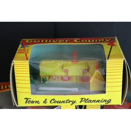 40 - Six boxed Lone Star  OOO Gauge Gulliver County Town & Country Planning rubber buildings to include 1... 