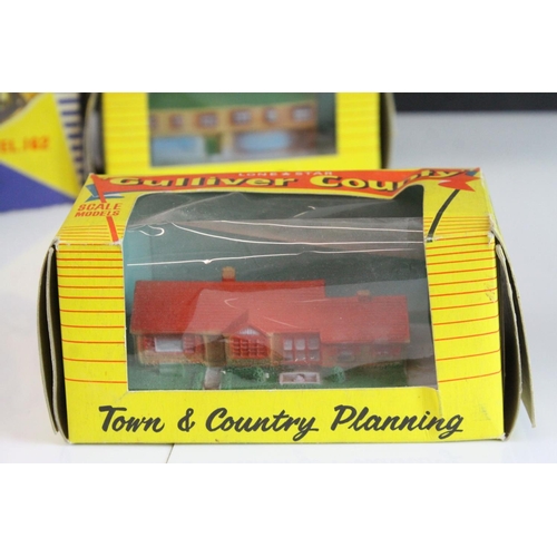 40 - Six boxed Lone Star  OOO Gauge Gulliver County Town & Country Planning rubber buildings to include 1... 