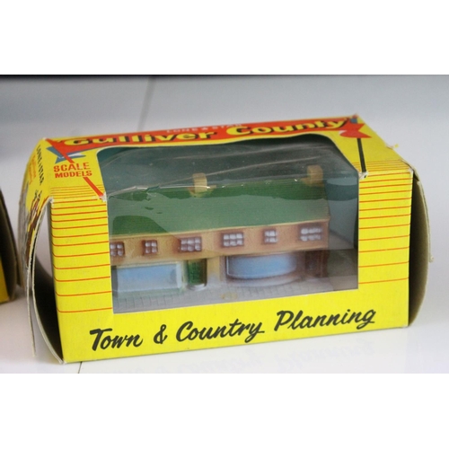 40 - Six boxed Lone Star  OOO Gauge Gulliver County Town & Country Planning rubber buildings to include 1... 