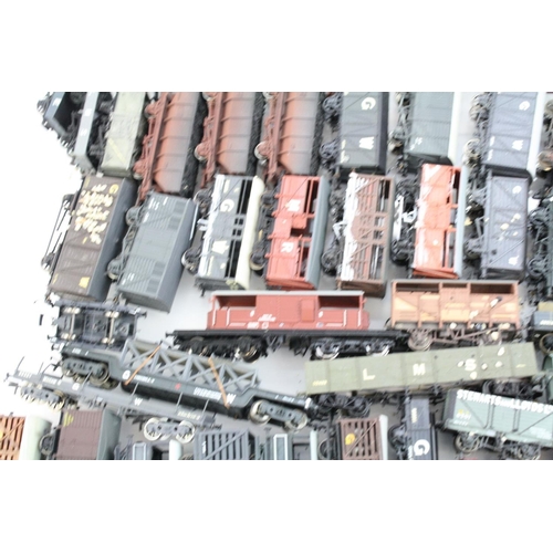 81 - Around 70 OO gauge items of rolling stock, all trucks and wagons to include Bachmann, Cooper Craft, ... 